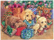 3 adorable lab puppies in front of the Christmas Tree with Presents